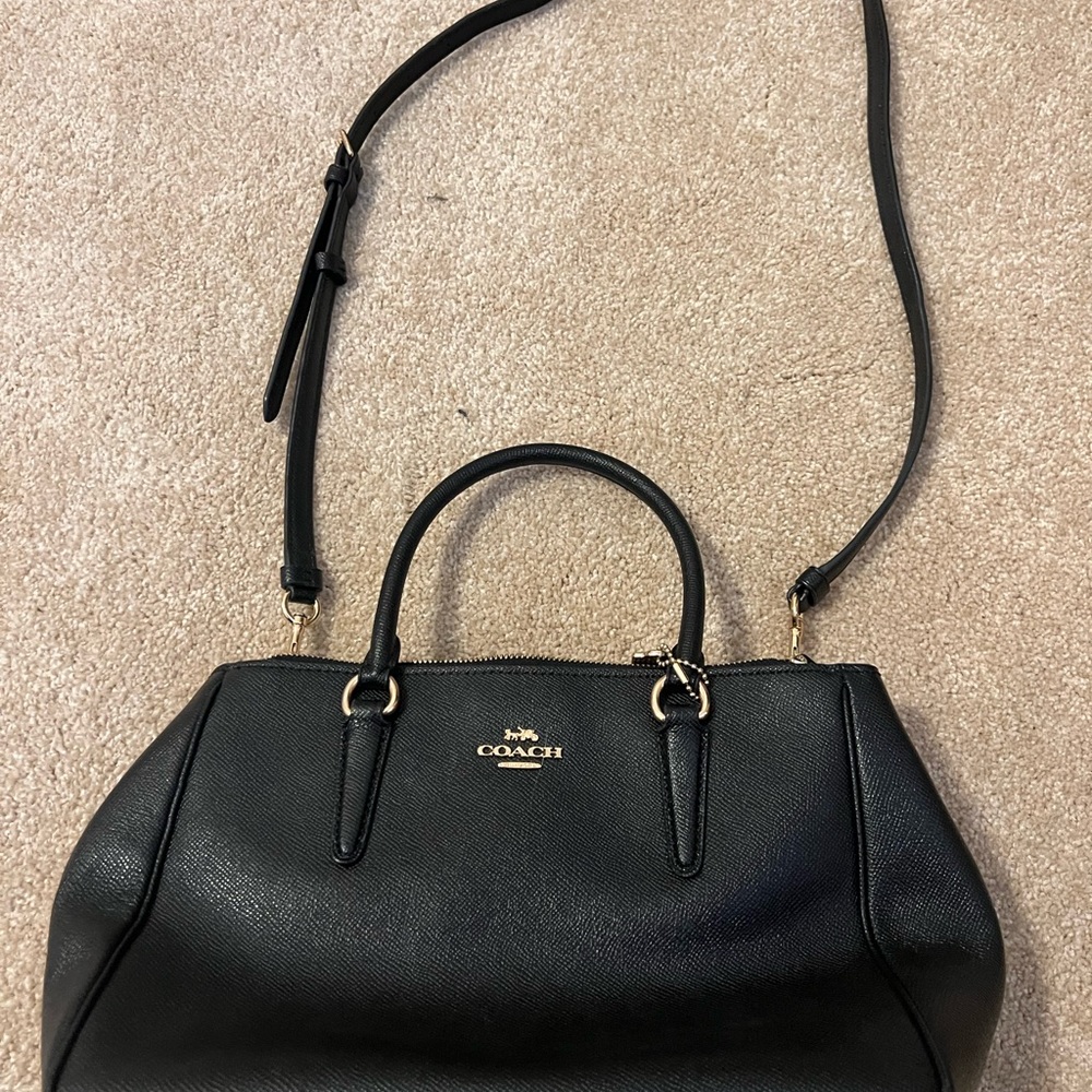Black and gold coach bag